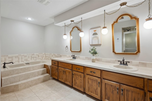 1645 NW 101st St, Clive, IA 50325 - bathroom featuring a garden tub, double vanity, tile patterned flooring, and a shower stall