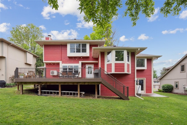 1645 NW 101st St, Clive, IA 50325 - rear view of property featuring a wooden deck, a yard, and a chimney