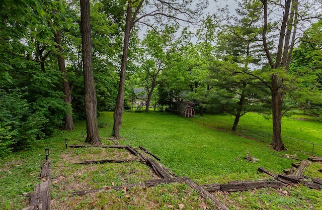 2606 Forest Dr, Des Moines, IA 50312 - view of yard with a storage unit