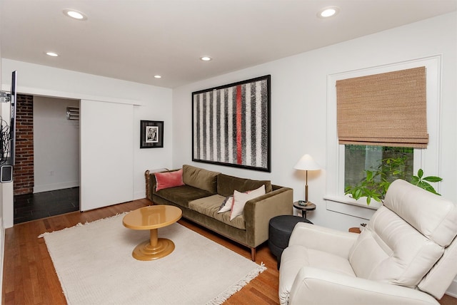 2606 Forest Dr, Des Moines, IA 50312 - living room with wood finished floors and recessed lighting