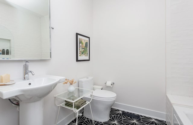 2606 Forest Dr, Des Moines, IA 50312 - full bathroom with tile patterned floors and toilet