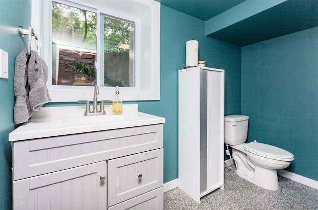 2606 Forest Dr, Des Moines, IA 50312 - half bath featuring baseboards and vanity