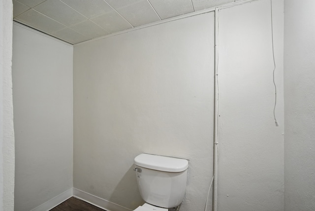 2407 E Tiffin Ave, Des Moines, IA 50317 - bathroom featuring toilet and baseboards