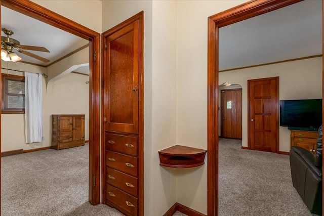 862 40th Pl, Des Moines, IA 50312 - hall with carpet floors, baseboards, and ornamental molding