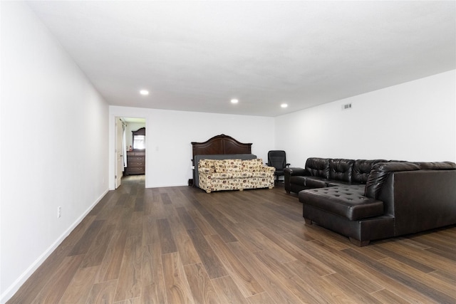 2357 Shadow Creek Cir, Des Moines, IA 50320 - living room with dark wood-type flooring, recessed lighting, and baseboards
