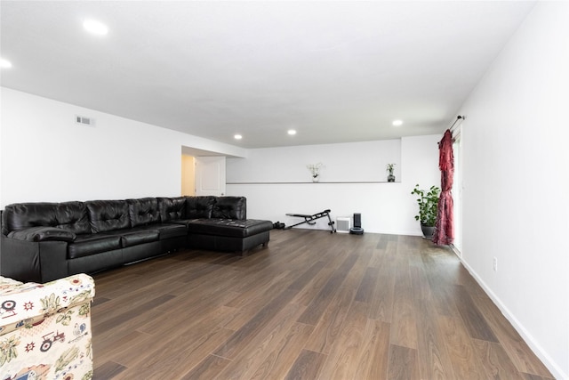 2357 Shadow Creek Cir, Des Moines, IA 50320 - living room featuring dark wood-style floors and recessed lighting