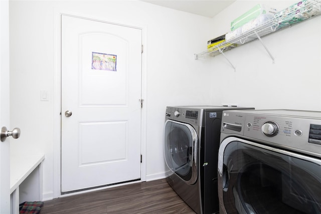 2357 Shadow Creek Cir, Des Moines, IA 50320 - laundry area featuring washing machine and dryer, dark wood-style floors, and baseboards