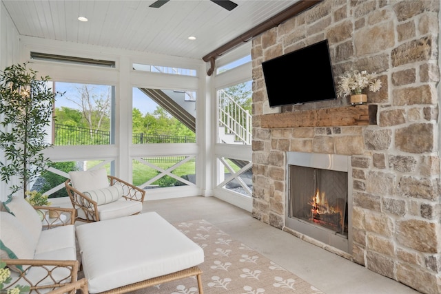 3834 NW 177th Ct, Clive, IA 50325 - sunroom / solarium with wood ceiling, plenty of natural light, concrete flooring, and recessed lighting