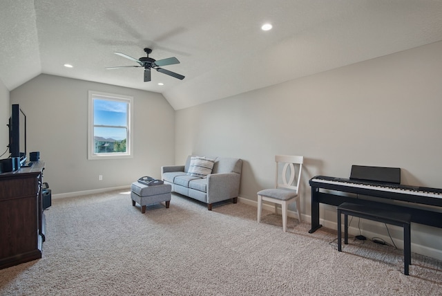 9012 NW 72nd Pl, Johnston, IA 50131 - living area featuring lofted ceiling, a ceiling fan, light carpet, baseboards, and recessed lighting