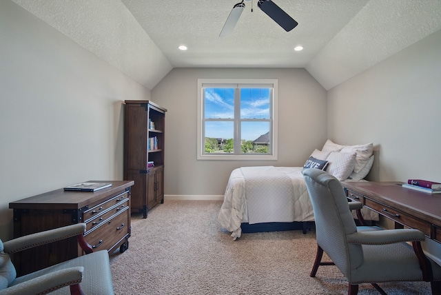 9012 NW 72nd Pl, Johnston, IA 50131 - bedroom with a textured ceiling, vaulted ceiling, light colored carpet, a ceiling fan, and baseboards