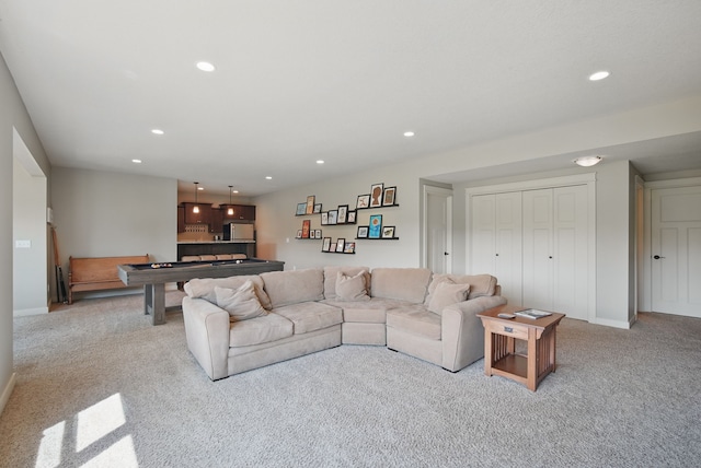 9012 NW 72nd Pl, Johnston, IA 50131 - living room with carpet floors, billiards table, recessed lighting, and baseboards