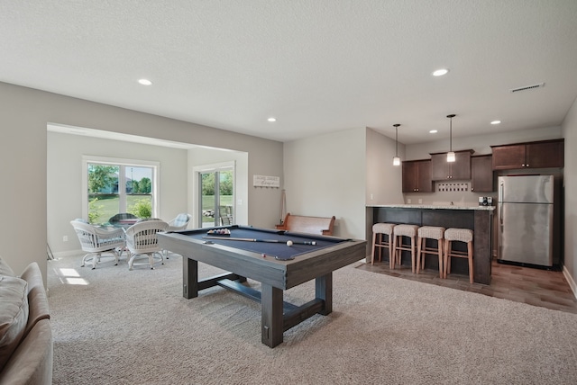 9012 NW 72nd Pl, Johnston, IA 50131 - rec room featuring carpet, recessed lighting, pool table, baseboards, and a textured ceiling