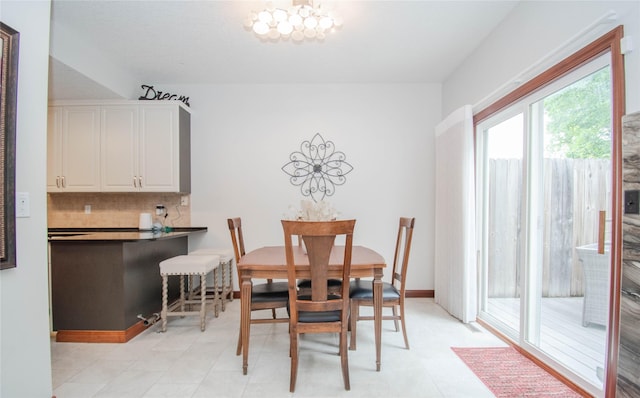 900 67th St Unit 503, West Des Moines, IA 50266 - dining space with a chandelier and light floors
