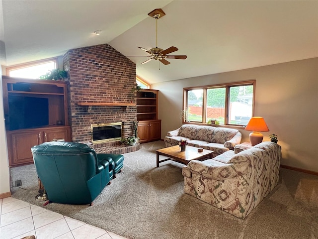 210 E 24th St N, Newton, IA 50208 - living room featuring ceiling fan, plenty of natural light, lofted ceiling, baseboards, and light carpet