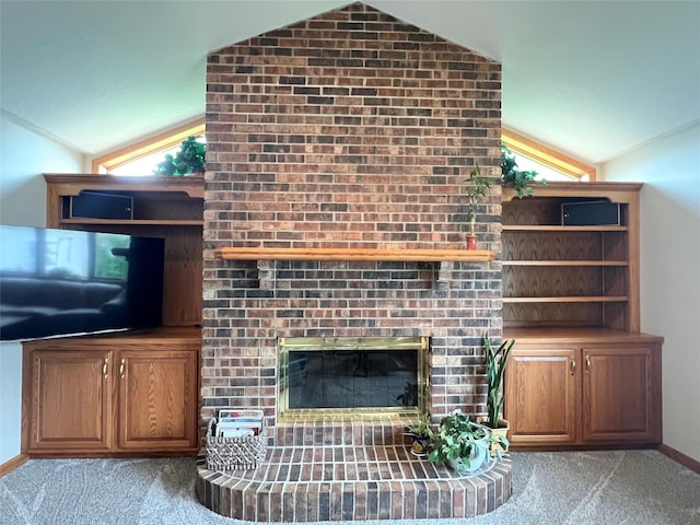 210 E 24th St N, Newton, IA 50208 - carpeted living area with lofted ceiling and a fireplace