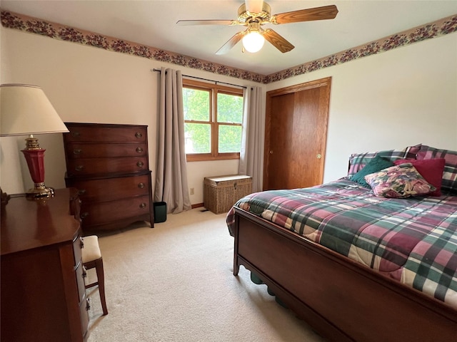 210 E 24th St N, Newton, IA 50208 - bedroom featuring light colored carpet and a ceiling fan