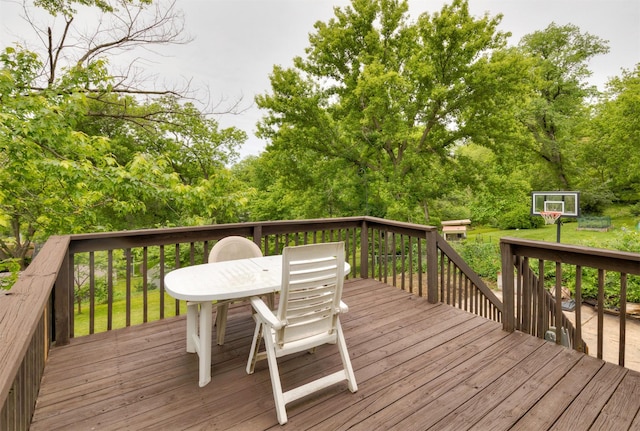 216 56th St, Des Moines, IA 50312 - wooden terrace with outdoor dining space