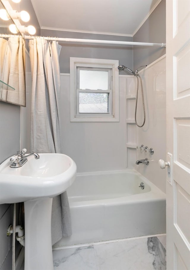 216 56th St, Des Moines, IA 50312 - bathroom featuring shower / bathtub combination with curtain, marble look tiles, ornamental molding, and a sink