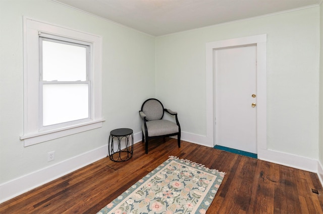 216 56th St, Des Moines, IA 50312 - sitting room with ornamental molding, dark wood-type flooring, and baseboards