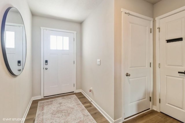 14225 Walnut Meadows Dr, Urbandale, IA 50323 - entrance foyer with wood finished floors and baseboards