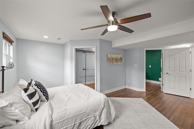 304 11th St SE, Altoona, IA 50009 - bedroom with wood finished floors, baseboards, recessed lighting, a closet, and a ceiling fan
