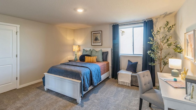 1001 NE 12th St, Grimes, IA 50111 - carpeted bedroom featuring baseboards