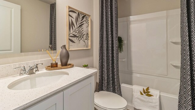 1001 NE 12th St, Grimes, IA 50111 - bathroom featuring vanity, toilet, and shower / tub combo with curtain