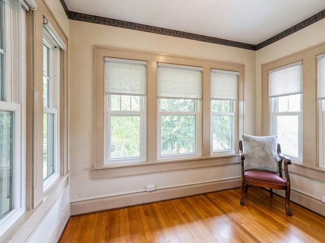 912 45th St, Des Moines, IA 50312 - living area with plenty of natural light and light wood-style floors