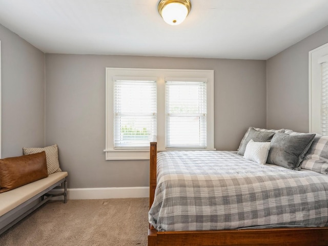 912 45th St, Des Moines, IA 50312 - bedroom with baseboards and carpet flooring