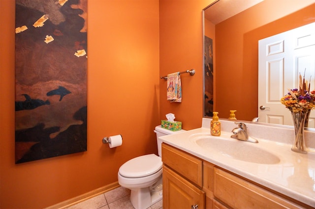 3739 155th Ct, Urbandale, IA 50323 - bathroom with tile patterned floors, toilet, vanity, and baseboards