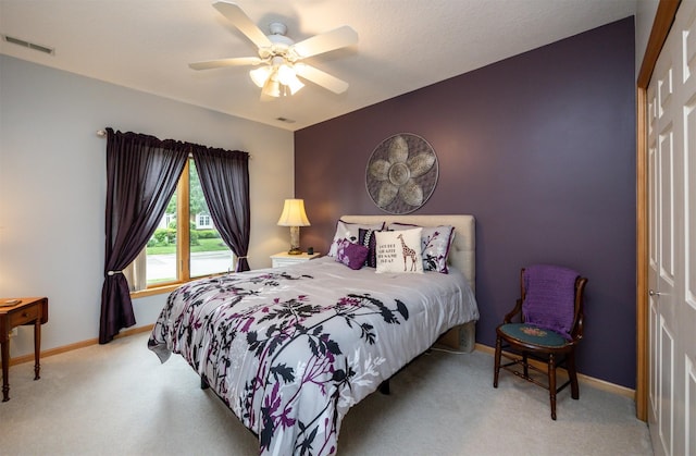 3739 155th Ct, Urbandale, IA 50323 - bedroom featuring carpet floors, baseboards, and a ceiling fan