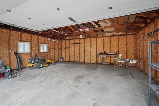 7105 Madison Ave, Urbandale, IA 50322 - garage with a garage door opener