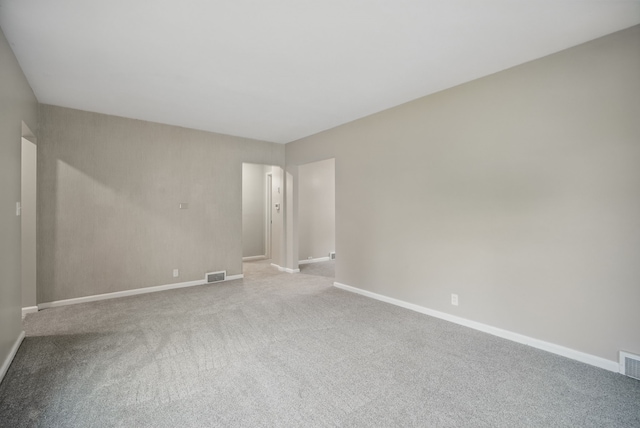 7105 Madison Ave, Urbandale, IA 50322 - carpeted spare room with baseboards