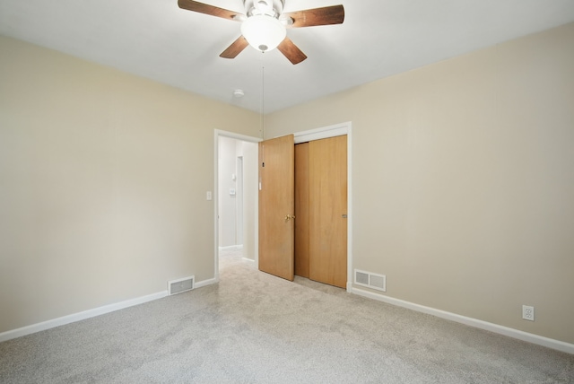 7105 Madison Ave, Urbandale, IA 50322 - carpeted spare room with ceiling fan and baseboards