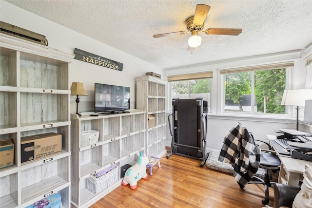 2419 30th St, Des Moines, IA 50310 - office with a textured ceiling, wood finished floors, and ceiling fan