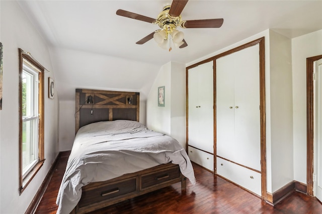 2419 30th St, Des Moines, IA 50310 - bedroom featuring wood finished floors, a ceiling fan, vaulted ceiling, baseboards, and a closet