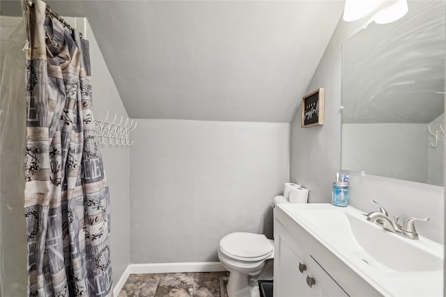 2419 30th St, Des Moines, IA 50310 - bathroom with lofted ceiling, vanity, toilet, baseboards, and a shower with curtain