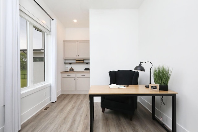 8019 NW 106th Ct, Johnston, IA 50131 - office featuring light wood-type flooring and baseboards