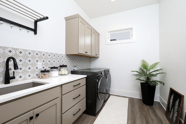 8019 NW 106th Ct, Johnston, IA 50131 - laundry room with washing machine and dryer, cabinet space, dark wood-style floors, and baseboards