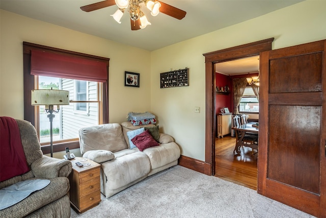 509 2nd Ave, Slater, IA 50244 - carpeted living area with ceiling fan and baseboards