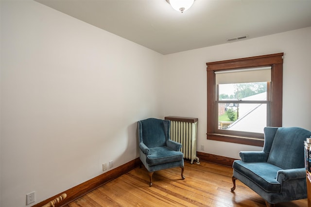 509 2nd Ave, Slater, IA 50244 - living area featuring baseboards and light wood-style floors