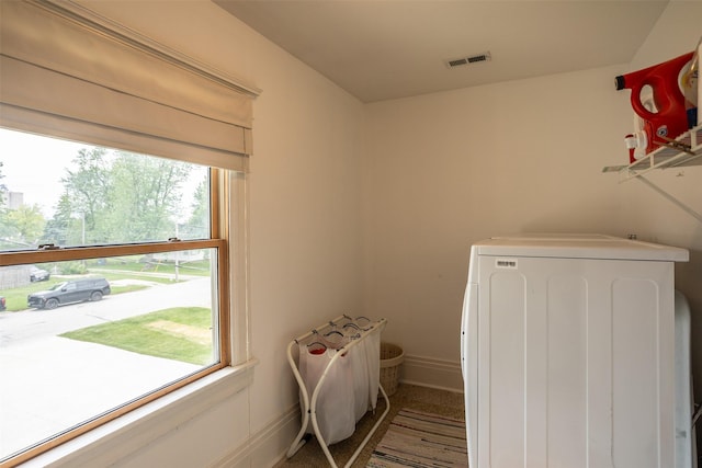 509 2nd Ave, Slater, IA 50244 - laundry room featuring washer / dryer and baseboards
