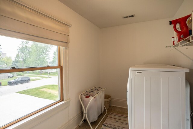 509 2nd Ave, Slater, IA 50244 - laundry room with washer / dryer and baseboards