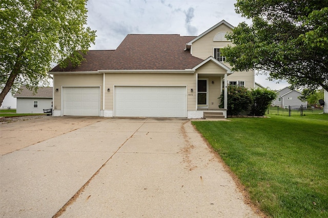 1804 W Cheyenne Ct, Polk City, IA 50226 - view of front of home with an attached garage, driveway, and roof with shingles