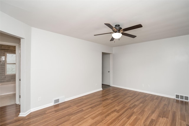3426 N Union St, Des Moines, IA 50316 - unfurnished room featuring ceiling fan, wood finished floors, and baseboards