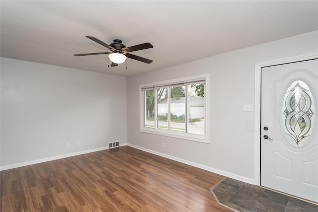 3426 N Union St, Des Moines, IA 50316 - foyer entrance with a ceiling fan, dark wood finished floors, and baseboards