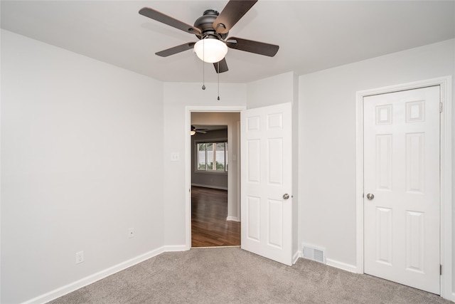 3426 N Union St, Des Moines, IA 50316 - unfurnished bedroom with carpet, baseboards, and ceiling fan