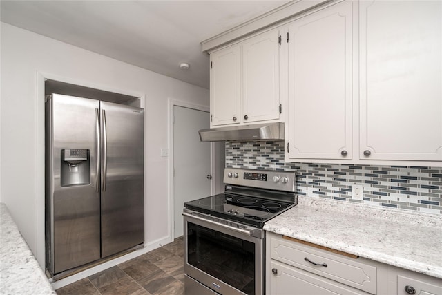 3426 N Union St, Des Moines, IA 50316 - kitchen featuring stainless steel appliances, under cabinet range hood, backsplash, white cabinetry, and light stone counters