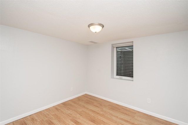 3426 N Union St, Des Moines, IA 50316 - spare room with light wood-style floors and baseboards
