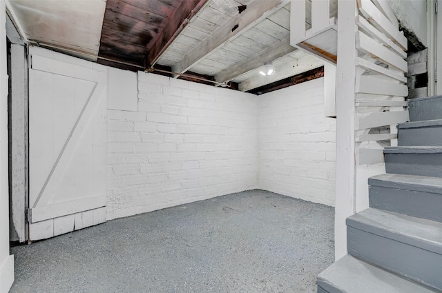 2403 E 14th St, Des Moines, IA 50316 - unfinished below grade area featuring wood ceiling